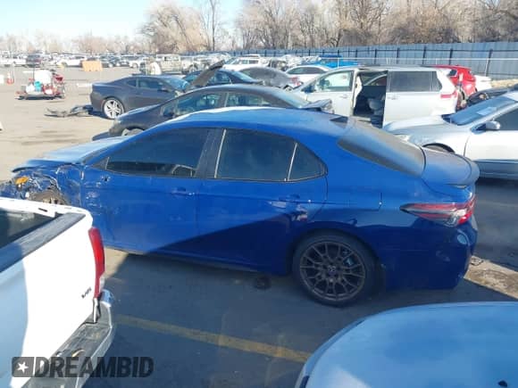 2023 Toyota Camry SE with VIN 4T1G11BK5PU105423, listed as a IAAI auction lot 41414587 with 38,527 mi miles and . Bid and sale history available at DreamBid. Image 14.