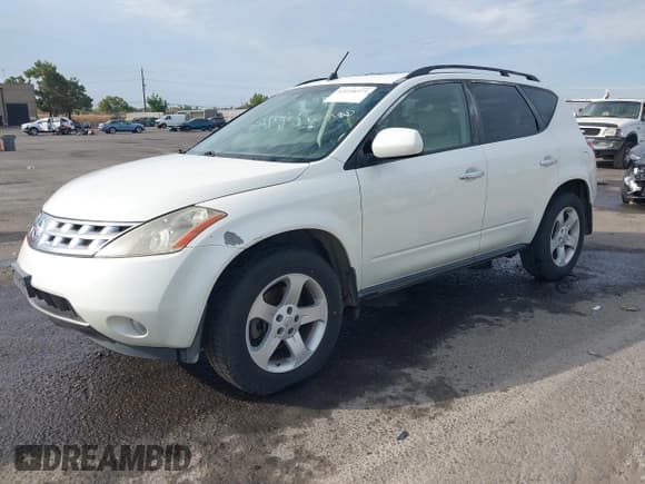 ✅ 2004 Nissan Murano SL • VIN: JN8AZ08W24W343385 • Lot: 43220373. Listed on IAAI with 270,720 mi. Free auction sales archive from the USA and detailed vehicle history report at DreamBid. Image 17.