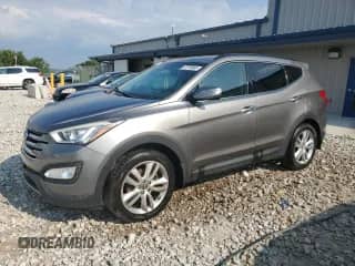 2013 Hyundai Santa Fe Sport with VIN 5XYZUDLA5DG099907, listed as a Copart auction lot 67758985 with 116,394 mi miles and Clean title. Bid and sale history available at DreamBid. Image 1.