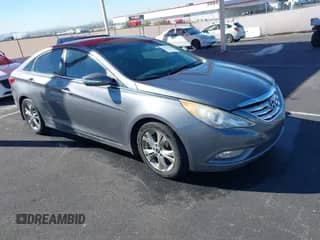 2012 Hyundai Sonata SE z VIN 5NPEC4AC0CH332427, wystawiony jako IAAI lot #43551037 z przebiegiem 121 362 mil mil oraz . Historia ofert i sprzedaży dostępna na DreamBid. Obrazek 1.