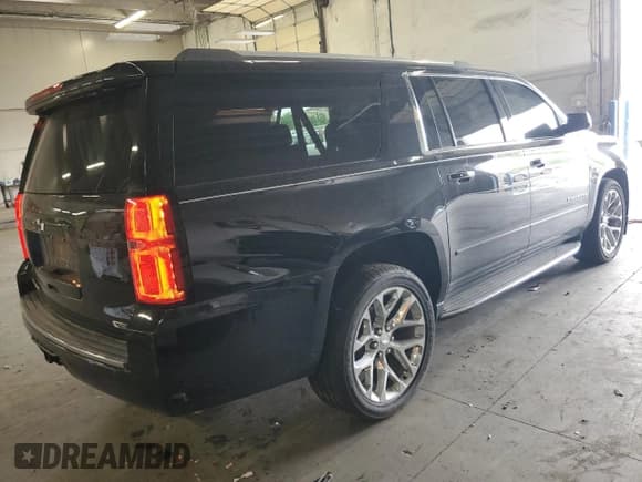 ✅ 2017 Chevrolet Suburban Premier • VIN: 1GNSKJKC1HR202327 • Lot: 63295664. Listed on Copart with 75,433 mi. Free auction sales archive from the USA and detailed vehicle history report at DreamBid. Image 3.