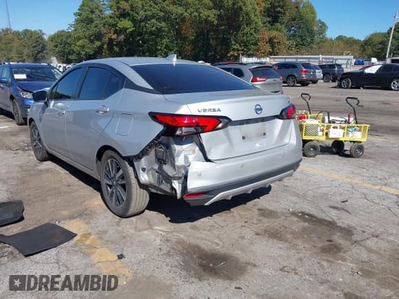 ✅ 2021 Nissan Versa SV • VIN: 3N1CN8EVXML826061 • Lot: 43499323. Listed on IAAI with 100,000 mi. Free auction sales archive from the USA and detailed vehicle history report at DreamBid. Image 3.