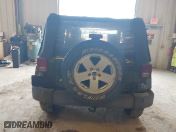 ✅ 2007 Jeep Wrangler Sahara • VIN: 1J4FA54187L125547 • Lot: 43487962. Listed on IAAI with 187,902 mi. Free auction sales archive from the USA and detailed vehicle history report at DreamBid. Image 16.