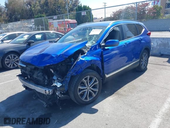 ✅ 2020 Honda CR-V Touring • VIN: 7FARW1H97LE011473 • Lot: 42368050. Listed on IAAI with 84,425 mi. Free auction sales archive from the USA and detailed vehicle history report at DreamBid. Image 2.