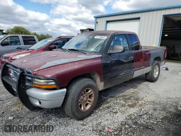 2002 Dodge Dakota с VIN 1B7GG42X12S660969, выставлен на аукционе Copart как лот 87199465 с пробегом 198 880 миль миль и Списание • Salvage title. История ставок и продаж доступна на DreamBid. Изображение 1.