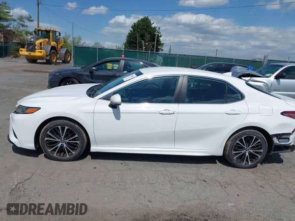 2019 Toyota Camry LE z VIN 4T1B11HK0KU754797, wystawiony jako IAAI lot #42032914 z przebiegiem 93 862 mil mil oraz . Historia ofert i sprzedaży dostępna na DreamBid. Obrazek 14.