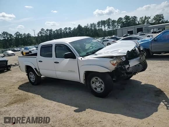 ✅ 2015 Toyota Tacoma PreRunner • VIN: 3TMJU4GN6FM179474 • Lot: 69581945. Listed on Copart with 211,078 mi. Free auction sales archive from the USA and detailed vehicle history report at DreamBid. Image 14.