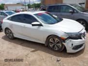 ✅ 2017 Honda Civic EX-L • VIN: 19XFC1F71HE014195 • Lot: 42377598. Listed on IAAI with 165,600 mi. Free auction sales archive from the USA and detailed vehicle history report at DreamBid. Image 13.