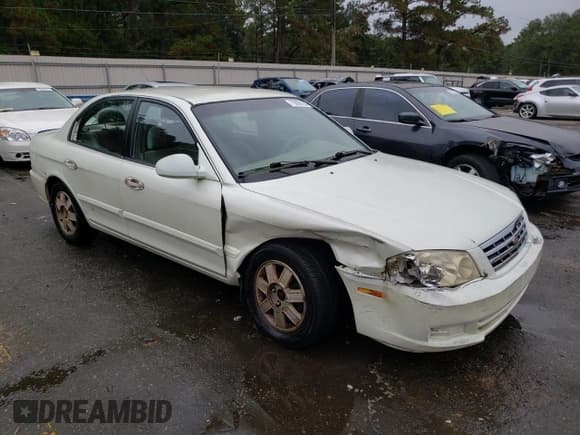 ✅ 2001 Kia Optima LX • VIN: KNAGD126715056027 • Lot: 79895184. Wystawiony na Copart z przebiegiem 116 478 mil. Bezpłatny archiwum sprzedaży aukcyjnych z USA i szczegółowy raport historii pojazdu na DreamBid. Zdjęcie 4.