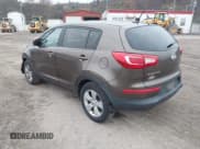 ✅ 2013 Kia Sportage LX • VIN: KNDPBCA2XD7499560 • Lot: 43779256. Listed on IAAI with 124,583 mi. Free auction sales archive from the USA and detailed vehicle history report at DreamBid. Image 3.