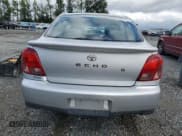 ✅ 2000 Toyota ECHO • VIN: JTDAT1239Y0040310 • Lot: 69115394. Listed on Copart with 103,347 mi. Free auction sales archive from the USA and detailed vehicle history report at DreamBid. Image 6.