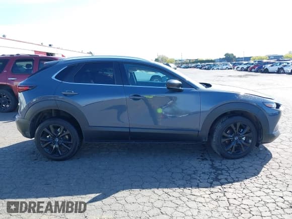 ✅ 2023 Mazda CX-30 S Carbon Edition • VIN: 3MVDMBCM1PM557862 • Lot: 41966734. Listed on IAAI with 36,757 mi. Free auction sales archive from the USA and detailed vehicle history report at DreamBid. Image 13.