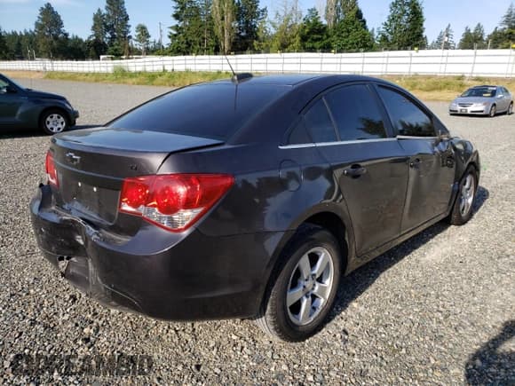✅ 2015 Chevrolet Cruze LT • VIN: 1G1PC5SB6F7297480 • Lot: 63379742. Listed on Copart with 98,943 mi. Free auction sales archive from the USA and detailed vehicle history report at DreamBid. Image 4.