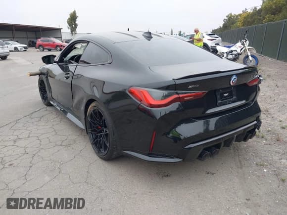 ✅ 2023 BMW M4 Competition xDrive • VIN: WBS43AZ07PCM99351 • Lot: 42643656. Listed on IAAI with 9,699 mi. Free auction sales archive from the USA and detailed vehicle history report at DreamBid. Image 3.