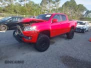 ✅ 2020 Chevrolet Colorado 4WD Z71 • VIN: 1GCGTDEN6L1215253 • Лот: 42343032. Опубликован ранее на IAAI с пробегом 61 632 миль. Бесплатный доступ к архиву аукционных продаж из США и подробный отчёт об истории автомобиля на DreamBid. Изображение 2.