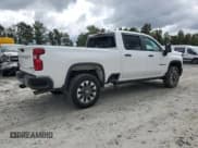 ✅ 2024 Chevrolet Silverado 2500HD Custom • VIN: 2GC1YME74R1253124 • Lot: 82267085. Listed on Copart with 9,765 mi. Free auction sales archive from the USA and detailed vehicle history report at DreamBid. Image 3.