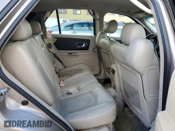 ✅ 2004 Cadillac SRX • VIN: 1GYEE637940169811 • Lot: 80681115. Wystawiony na Copart z przebiegiem Nie podano. Bezpłatny archiwum sprzedaży aukcyjnych z USA i szczegółowy raport historii pojazdu na DreamBid. Zdjęcie 10.
