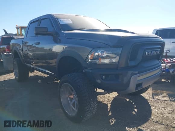 ✅ 2016 Ram 1500 Rebel • VIN: 1C6RR7YT1GS271451 • Lot: 43917940. Listed on IAAI with 144,633 mi. Free auction sales archive from the USA and detailed vehicle history report at DreamBid. Image 1.