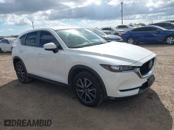 ✅ 2018 Mazda CX-5 Touring • VIN: JM3KFACM6J1409067 • Лот: 43716812. Опубликован ранее на IAAI с пробегом 76 489 миль. Бесплатный доступ к архиву аукционных продаж из США и подробный отчёт об истории автомобиля на DreamBid. Изображение 1.