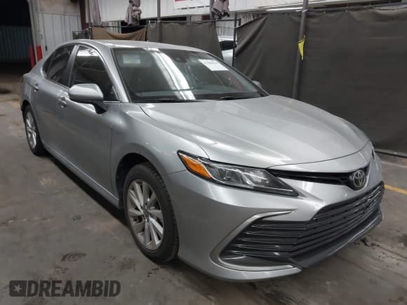 ✅ 2021 Toyota Camry LE • VIN: 4T1C11AK1MU477806 • Lot: 43484644. Listed on IAAI with 46,975 mi. Free auction sales archive from the USA and detailed vehicle history report at DreamBid. Image 1.
