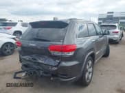 ✅ 2014 Jeep Grand Cherokee Overland • VIN: 1C4RJFCG6EC211600 • Lot: 43289489. Listed on IAAI with 133,935 mi. Free auction sales archive from the USA and detailed vehicle history report at DreamBid. Image 4.