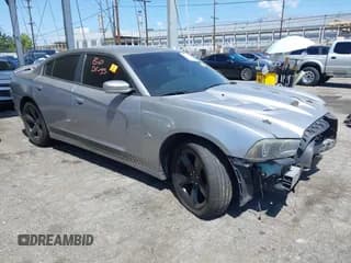 ✅ 2014 Dodge Charger SXT Plus • VIN: 2C3CDXHG8EH330603 • Lot: 42255042. Listed on IAAI with 184,284 mi. Free auction sales archive from the USA and detailed vehicle history report at DreamBid. Image 1.