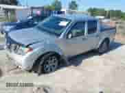 2020 Nissan Frontier SV with VIN 1N6ED0EB2LN713376, listed as a IAAI auction lot 42656971 with 57,916 mi miles and . Bid and sale history available at DreamBid. Image 2.