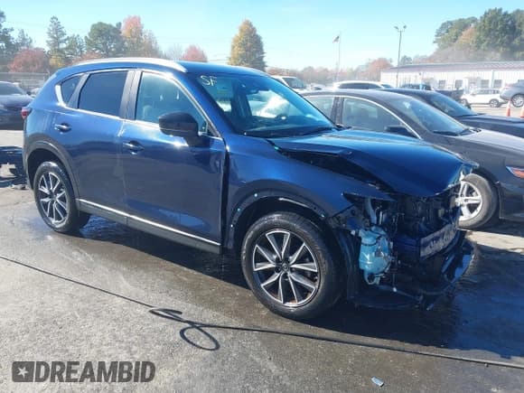 ✅ 2018 Mazda CX-5 Touring • VIN: JM3KFBCM4J0351052 • Lot: 43574119. Wystawiony na IAAI z przebiegiem 118 096 mil. Bezpłatny archiwum sprzedaży aukcyjnych z USA i szczegółowy raport historii pojazdu na DreamBid. Zdjęcie 1.