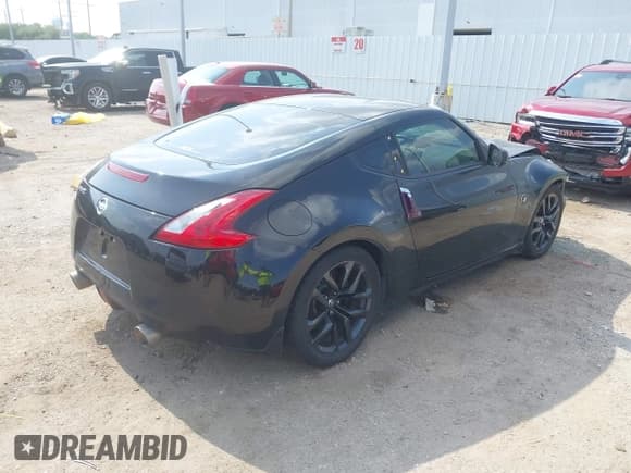 ✅ 2016 Nissan 370Z • VIN: JN1AZ4EH8GM931402 • Lot: 42273424. Wystawiony na IAAI z przebiegiem 105 184 mil. Bezpłatny archiwum sprzedaży aukcyjnych z USA i szczegółowy raport historii pojazdu na DreamBid. Zdjęcie 4.