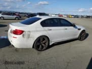 ✅ 2013 BMW M5 • VIN: WBSFV9C51DC772446 • Lot: 85179955. Listed on Copart with 152,954 mi. Free auction sales archive from the USA and detailed vehicle history report at DreamBid. Image 3.