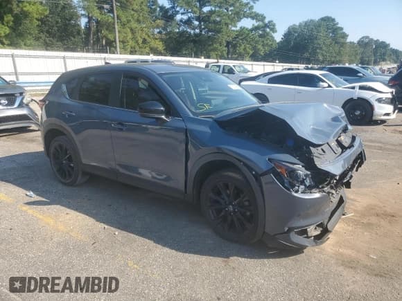 ✅ 2021 Mazda CX-5 Carbon Edition • VIN: JM3KFBCY7M0453842 • Лот: 84977175. Опубликован ранее на Copart с пробегом 50 274 миль. Бесплатный доступ к архиву аукционных продаж из США и подробный отчёт об истории автомобиля на DreamBid. Изображение 4.