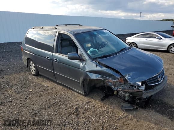 ✅ 2003 Honda Odyssey EX-L • VIN: 5FNRL189X3B119770 • Lot: 70821225. Listed on Copart with 310,420 mi. Free auction sales archive from the USA and detailed vehicle history report at DreamBid. Image 4.