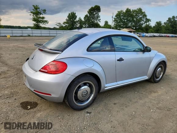 ✅ 2015 Volkswagen Beetle Fleet Edition • VIN: 3VWF17ATXFM603372 • Lot: 65582455. Listed on Copart with 56,785 mi. Free auction sales archive from the USA and detailed vehicle history report at DreamBid. Image 3.