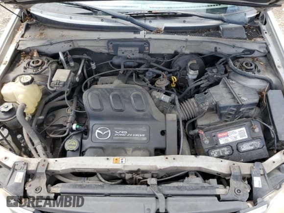 ✅ 2001 Mazda Tribute LX • VIN: 4F2CU08171KM08452 • Lot: 65831605. Listed on Copart with 208,337 mi. Free auction sales archive from the USA and detailed vehicle history report at DreamBid. Image 12.