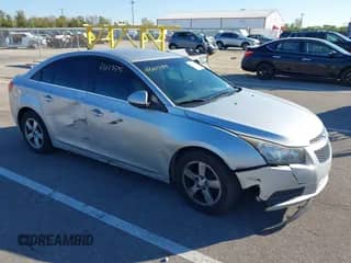 2014 Chevrolet Cruze 1LT with VIN 1G1PC5SB2E7258013, listed as a IAAI auction lot 43417395 with 219,609 mi miles and . Bid and sale history available at DreamBid. Image 1.