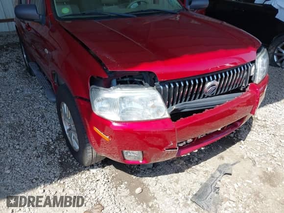 2006 Mercury Mariner Luxury z VIN 4M2YU56186KJ03260, wystawiony jako IAAI lot #42010188 z przebiegiem 103 673 mil mil oraz . Historia ofert i sprzedaży dostępna na DreamBid. Obrazek 15.