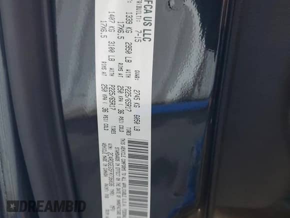 2015 Dodge Grand Caravan R/T with VIN 2C4RDGEG5FR736036, listed as a Copart auction lot 90314845 with 113,784 mi miles and Salvage title. Bid and sale history available at DreamBid. Image 13.