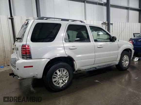 2007 Mercury Mariner Premier с VIN 4M2CU97127KJ20010, выставлен на аукционе Copart как лот 52123205 с пробегом 162 337 миль миль и Списание • Salvage title. История ставок и продаж доступна на DreamBid. Изображение 3.