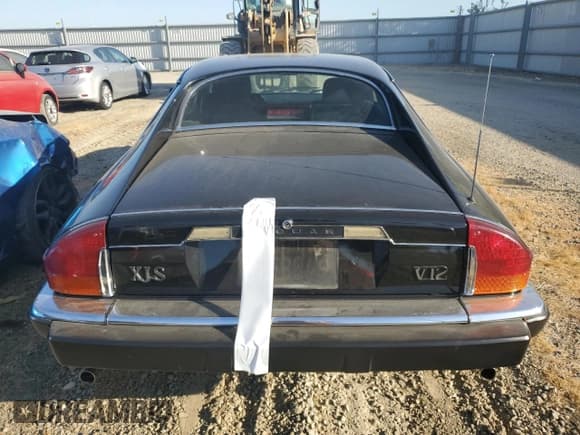 ✅ 1989 Jaguar XJS • VIN: SAJNA5849KC156340 • Lot: 81369415. Wystawiony na Copart z przebiegiem 82 457 mil. Bezpłatny archiwum sprzedaży aukcyjnych z USA i szczegółowy raport historii pojazdu na DreamBid. Zdjęcie 6.