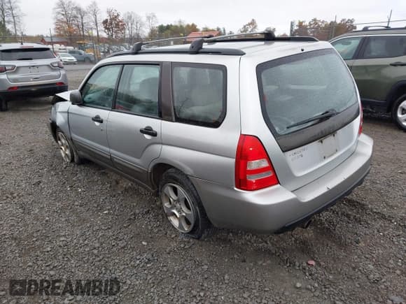 ✅ 2004 Subaru Forester XS • VIN: JF1SG65604H721338 • Lot: 43562108. Listed on IAAI with 194,707 mi. Free auction sales archive from the USA and detailed vehicle history report at DreamBid. Image 3.
