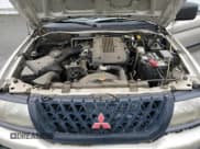 ✅ 2000 Mitsubishi Montero Sport LS • VIN: JA4LS31H3YP019989 • Lot: 82031914. Wystawiony na Copart z przebiegiem 154 176 mil. Bezpłatny archiwum sprzedaży aukcyjnych z USA i szczegółowy raport historii pojazdu na DreamBid. Zdjęcie 14.