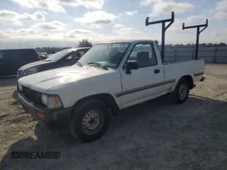 ✅ 1992 Toyota Pickup • VIN: JT4RN81A9N0091677 • Lot: 80134055. Wystawiony na Copart z przebiegiem 257 361 mil. Bezpłatny archiwum sprzedaży aukcyjnych z USA i szczegółowy raport historii pojazdu na DreamBid. Zdjęcie 1.