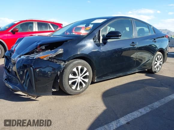 ✅ 2021 Toyota Prius L Eco • VIN: JTDKAMFU5M3146454 • Lot: 43462876. Wystawiony na IAAI z przebiegiem 93 810 mil. Bezpłatny archiwum sprzedaży aukcyjnych z USA i szczegółowy raport historii pojazdu na DreamBid. Zdjęcie 17.