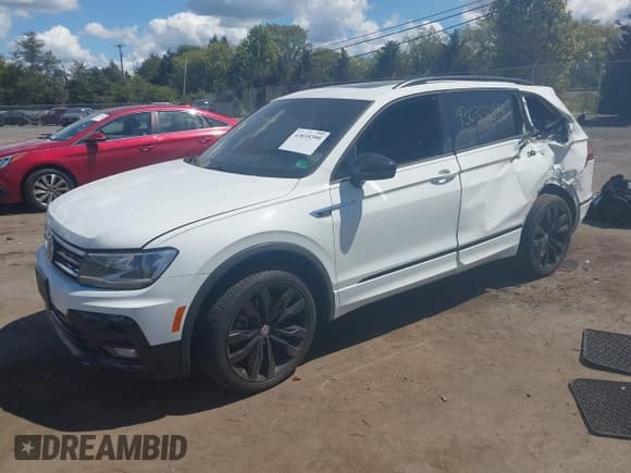 ✅ 2021 Volkswagen Tiguan SE • VIN: 3VV2B7AX5MM054356 • Lot: 43035399. Wystawiony na IAAI z przebiegiem 87 671 mil. Bezpłatny archiwum sprzedaży aukcyjnych z USA i szczegółowy raport historii pojazdu na DreamBid. Zdjęcie 2.