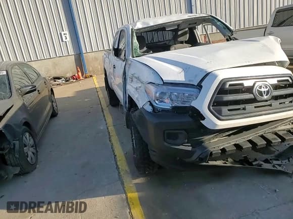 ✅ 2016 Toyota Tacoma SR • VIN: 5TFSX5EN7GX041538 • Lot: 86790145. Listed on Copart with 156,709 mi. Free auction sales archive from the USA and detailed vehicle history report at DreamBid. Image 13.