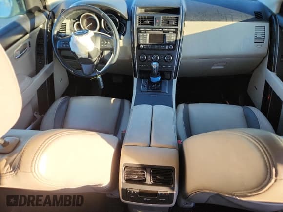 ✅ 2012 Mazda CX-9 Touring • VIN: JM3TB2CA6C0339980 • Lot: 90283725. Wystawiony na Copart z przebiegiem 180 557 mil. Bezpłatny archiwum sprzedaży aukcyjnych z USA i szczegółowy raport historii pojazdu na DreamBid. Zdjęcie 8.