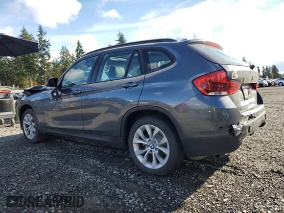 ✅ 2014 BMW X1 xDrive28i • VIN: WBAVL1C55EVY15070 • Lot: 90284425. Listed on Copart with 133,099 mi. Free auction sales archive from the USA and detailed vehicle history report at DreamBid. Image 2.