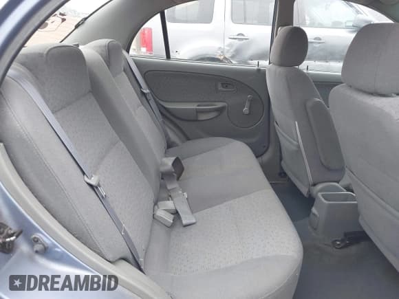 ✅ 2003 Kia Rio • VIN: KNADC125736236506 • Лот: 41467649. Опубликован ранее на IAAI с пробегом 109 975 миль. Бесплатный доступ к архиву аукционных продаж из США и подробный отчёт об истории автомобиля на DreamBid. Изображение 8.