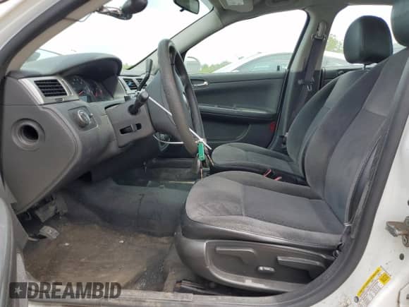 2016 Chevrolet Impala Police Police with VIN 2G1WD5E34G1101208, listed as a Copart auction lot 57504775 with 96,372 mi miles and Salvage title. Bid and sale history available at DreamBid. Image 7.