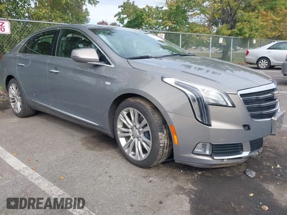 ✅ 2019 Cadillac XTS Luxury • VIN: 2G61M5S38K9143447 • Lot: 43447448. Listed on IAAI with 122,373 mi. Free auction sales archive from the USA and detailed vehicle history report at DreamBid. Image 1.